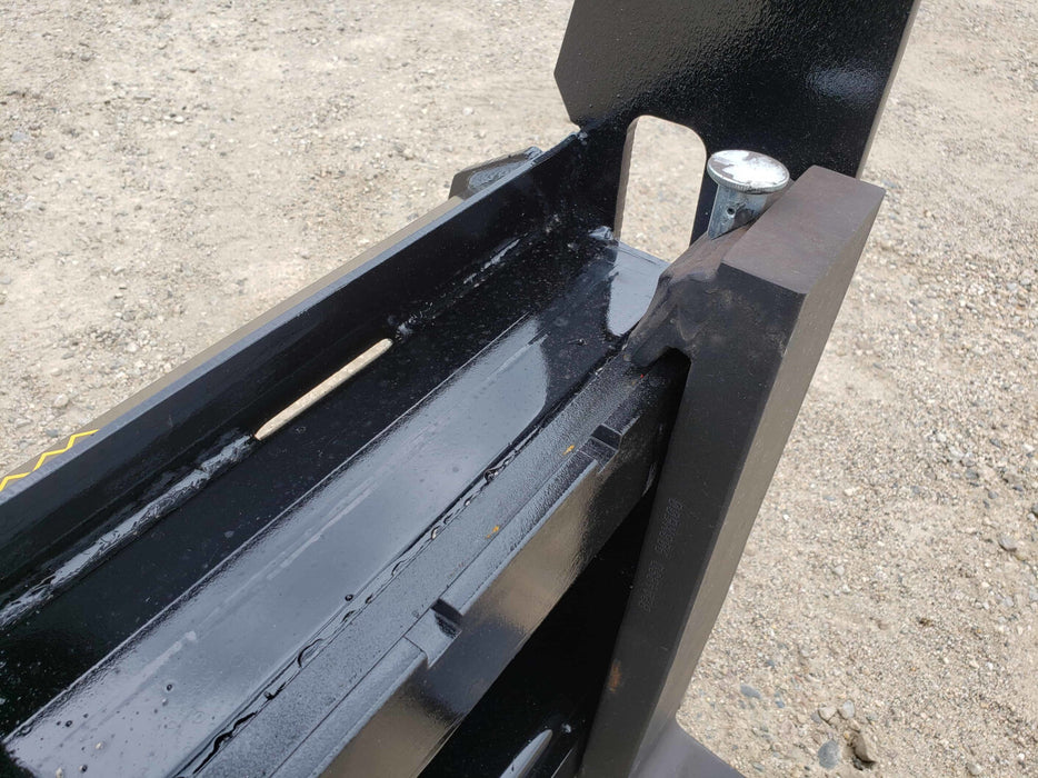 Close-up of Stinger skid steer pallet forks tines and reinforced frame – engineered for strength, balance, and safety.