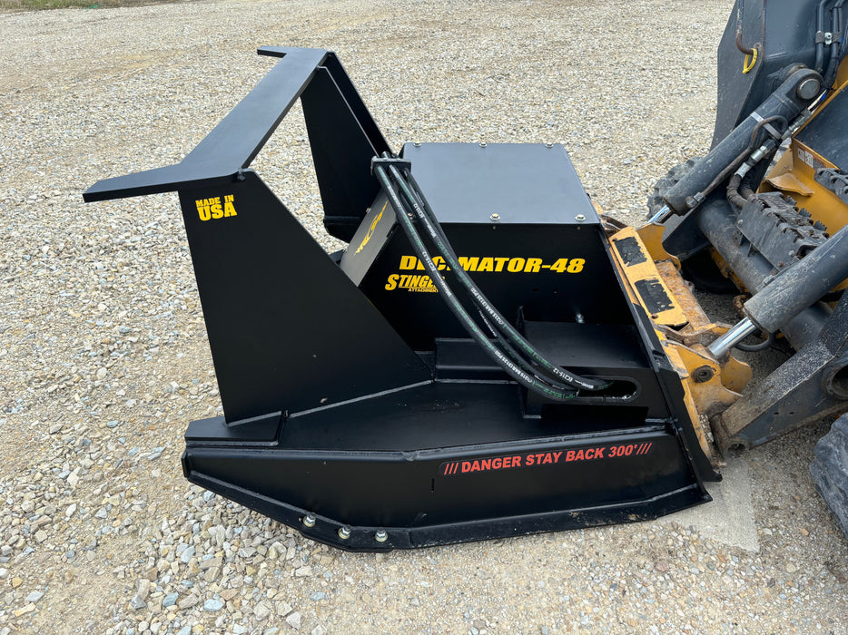 Close-up of Stinger Decimator skid steer disc mulcher blades and cutting disc – built with premium materials for long-lasting durability.