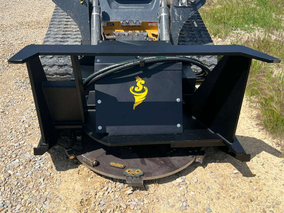 Top view of Stinger Decimator skid steer disc mulcher showing reinforced steel housing – industrial-grade durability and safety design.