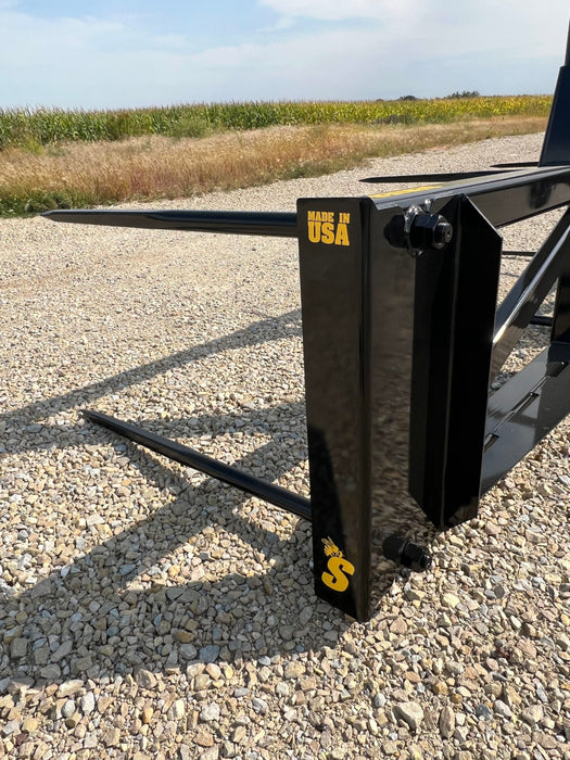 Close-up of Stinger Series 5XD bale spear tines and steel frame – engineered for precision, control, and long-lasting performance.