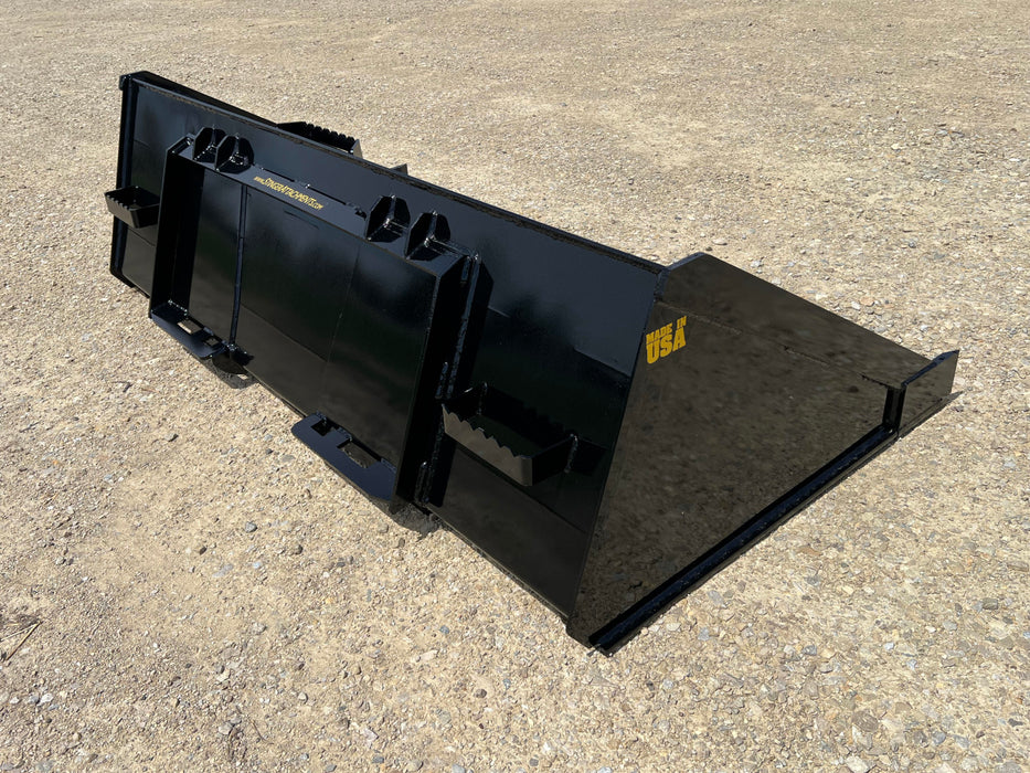 Front view of Stinger skid steer material bucket filled with sand – heavy-duty bucket designed for superior durability and efficiency.
