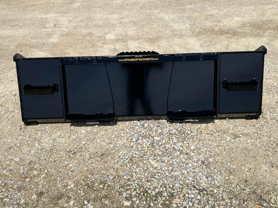 Front view of Stinger skid steer material bucket filled with gravel – professional-grade design for superior load control and strength.
