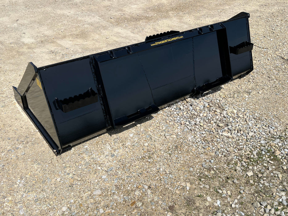 Series 1 heavy-duty skid steer material bucket by Stinger moving sand – engineered for precise handling and smooth operation.