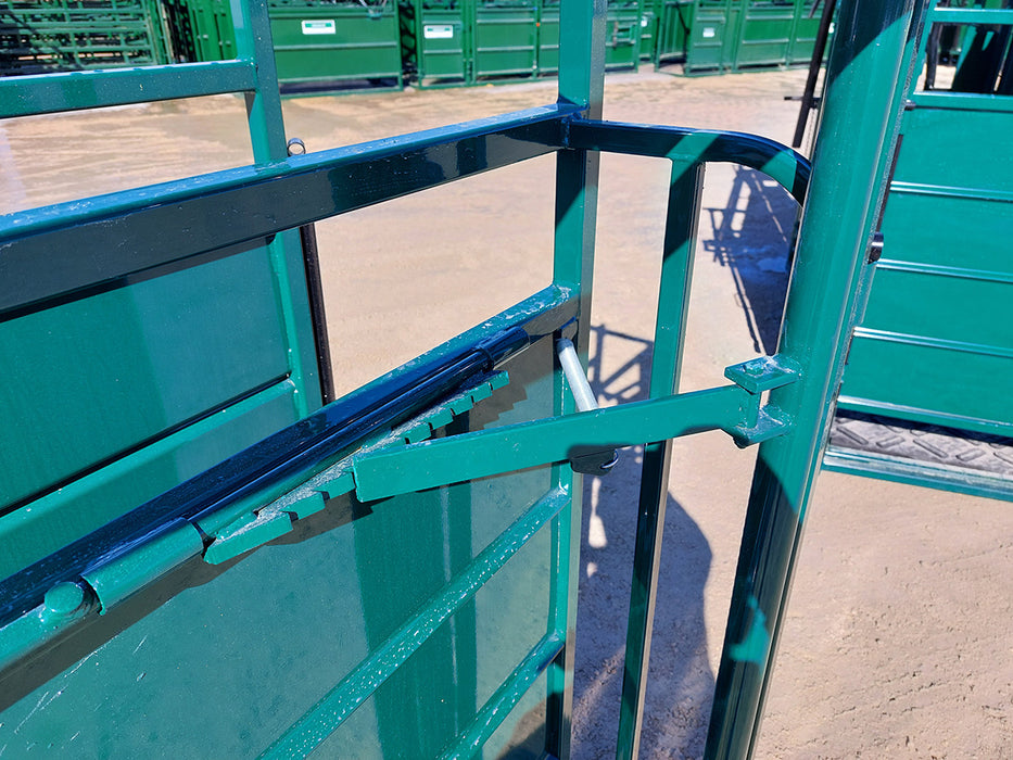 Durable 8ft Adjustable Cattle Alley connected to a cattle chute for smooth animal flow