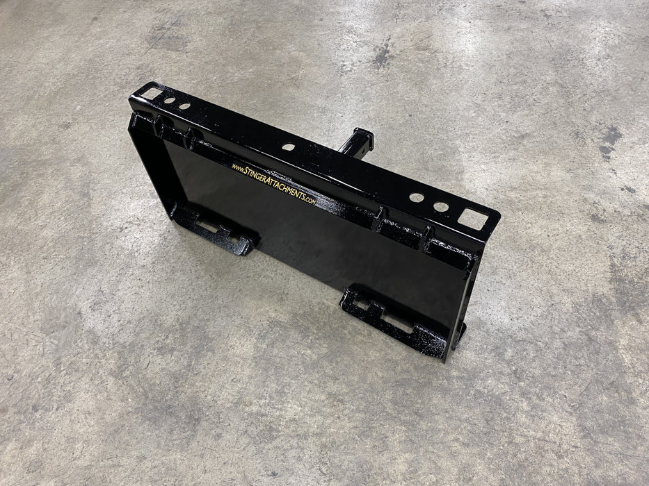 Operator using compact tractor skid steer receiver hitch to move trailer – efficient design for precise control and smooth transport.