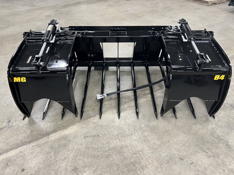 Close-up of Stinger skid steer manure grapple tines and hydraulic arms – reinforced design ensures strength and precision.