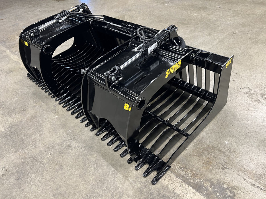 Front view of heavy-duty skid steer rock bucket filled with rocks – designed for optimal sifting and soil separation performance.