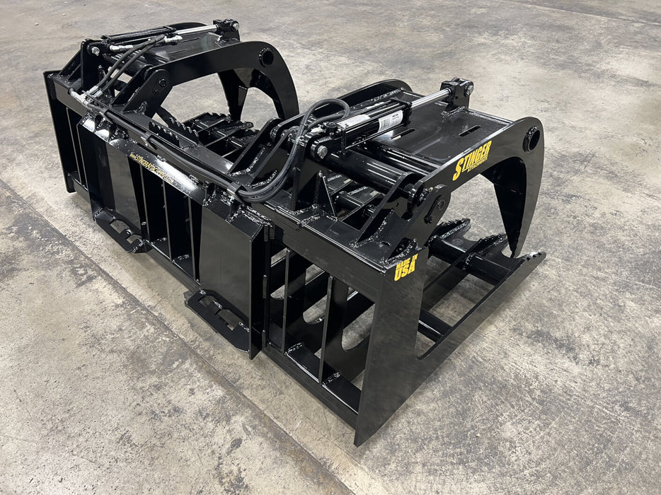 Stinger tractor root grapple designed for extreme-duty land clearing, root removal, and debris handling.