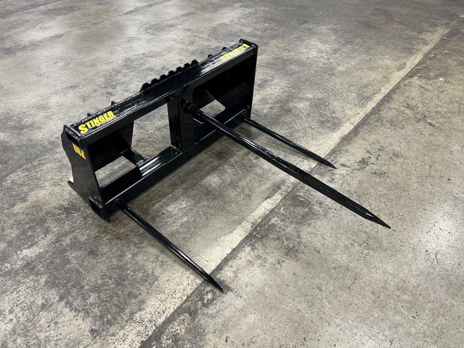 Close-up of Stinger Attachments bale spear tines and reinforced frame – precision-engineered for long-lasting performance and strength.