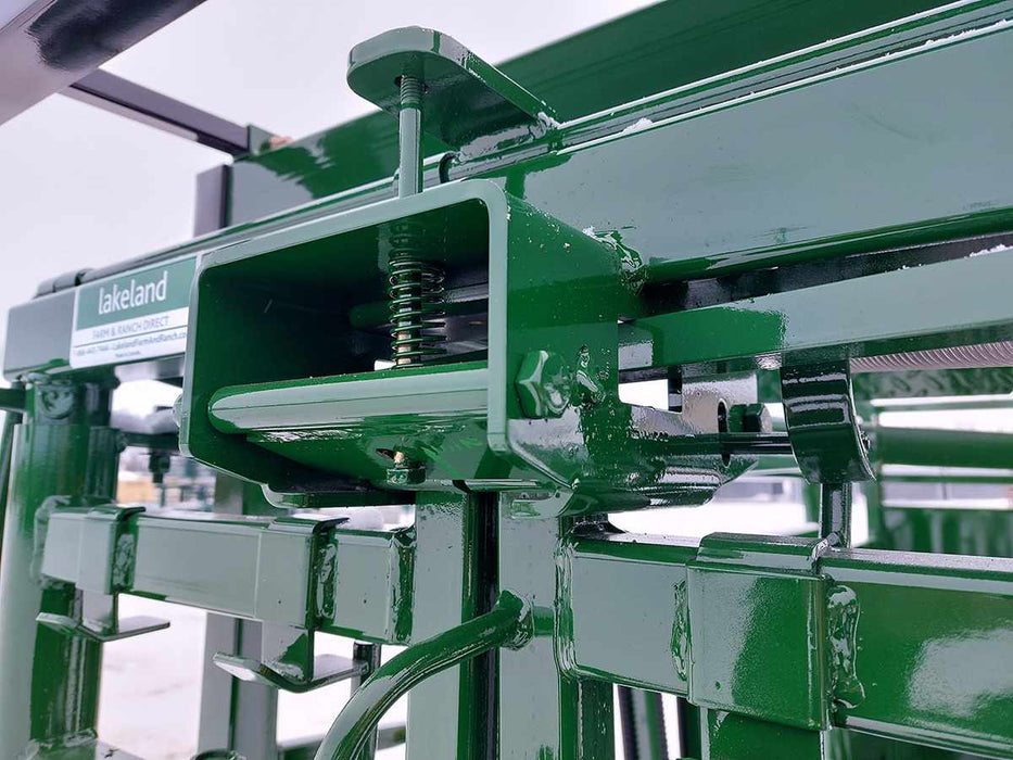 Close-up of locking mechanisms and head gate on Lakeland Easy Catch Cattle Squeeze Chute