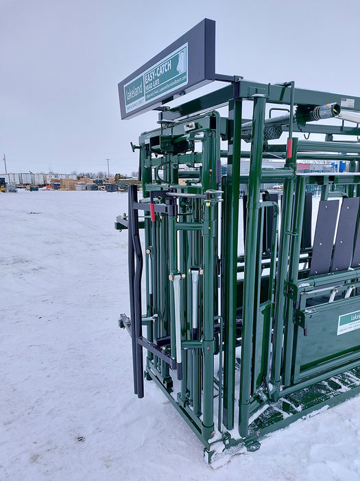 Heavy-duty Lakeland Cattle Squeeze Chute connected to portable alley for smooth cattle flow