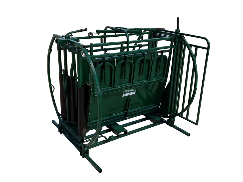 Farmer operating Lakeland Calf Table to safely rotate and inspect calves for tagging or treatment