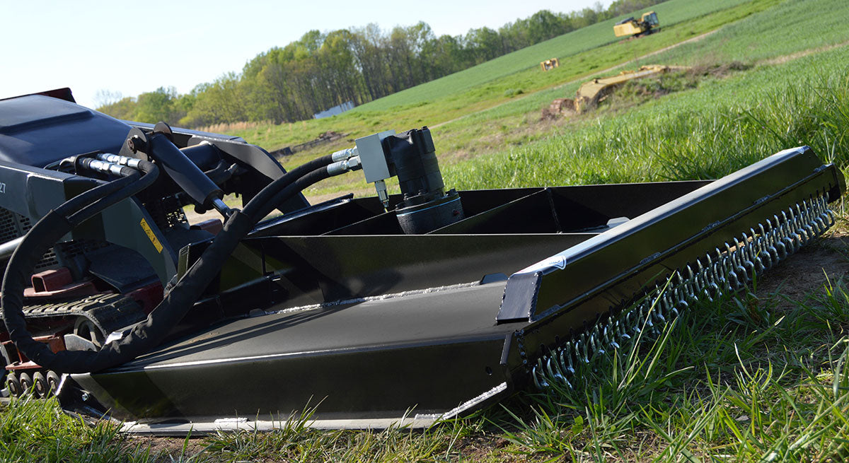 Loflin Mini Skid Steer Brush Cutter attachment designed for cutting grass, brush, and small trees with powerful, compact performance.