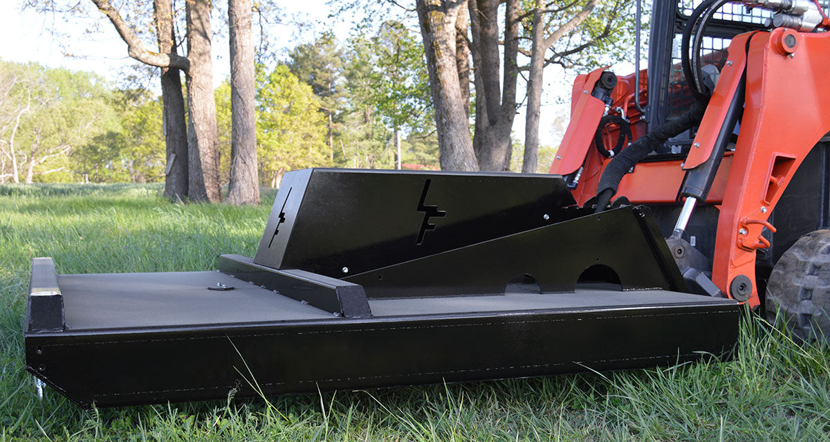 LF Closed Front Skid Steer Brush Cutter with heavy-duty blades, designed for clearing thick brush, grass, and small trees efficiently.