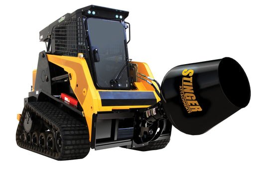 Heavy-duty Tractor Cement Mixer attachment mounted on a skid steer, mixing fresh concrete on a construction site.