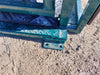 Cattle Squeeze Chute positioned in working pen for secure livestock management