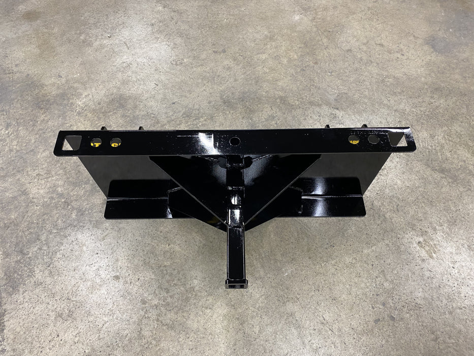 Close-up of heavy-duty skid steer receiver showing reinforced 2-inch hitch – engineered for strength, durability, and secure connection.