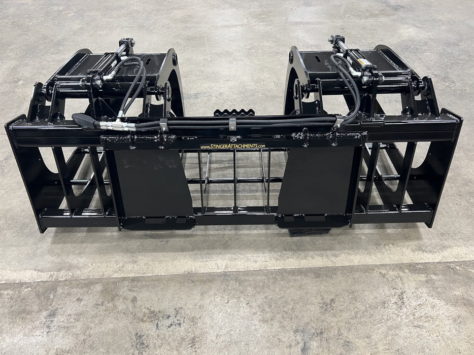 Close-up of the Rock Grapple tines and reinforced steel frame designed for tough digging and material handling.