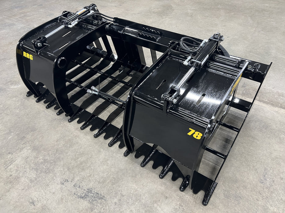 Side view of the Rock Grapple showing powerful hydraulic jaws gripping rocks tightly for precise control.