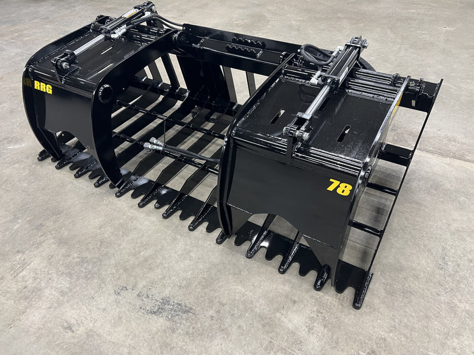 Operator using a Rock Grapple to sort and move heavy rocks on a construction or farm site.