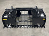 Heavy-duty Rock Grapple with dual clamp arms demonstrating strong hold and efficient ground penetration.
