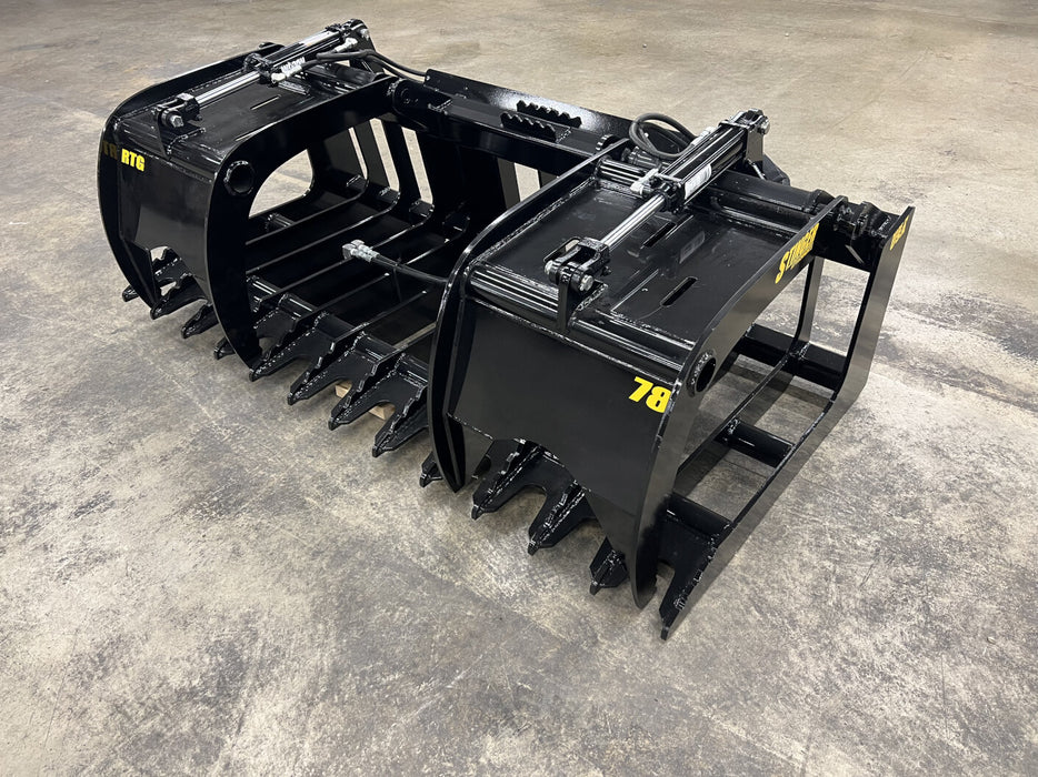 Operator using a tractor root grapple to remove tree roots and heavy debris from a construction area.