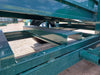 Close-up of ramp surface on E-Series portable loading chute for cattle featuring non-slip grip design